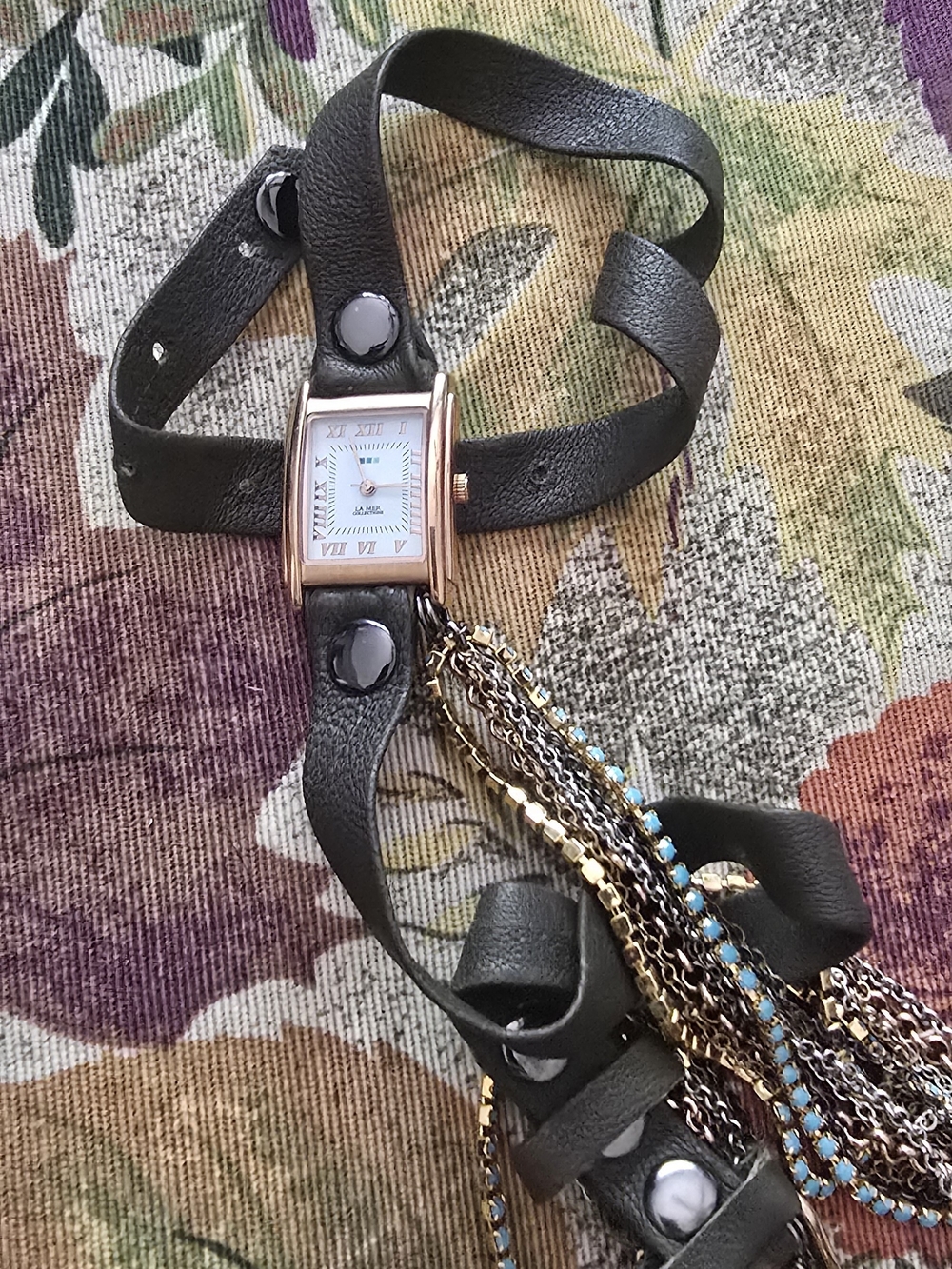 Women's Black Leather Wrap Watch with Gold-Tone Case and Chain Tassel